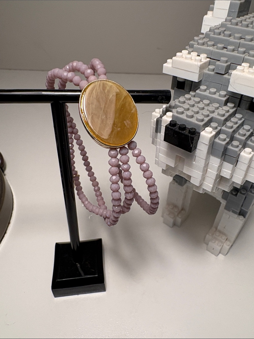 Plunder brand facetedLavender Beaded Bracelet with oval inset